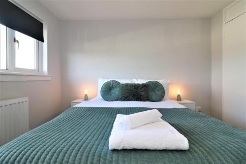 Säng eller sängar i ett rum på Signature - Morland House