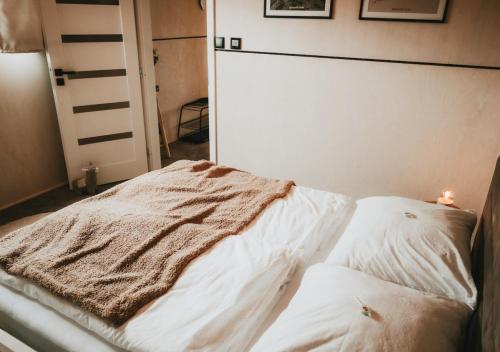 Postel nebo postele na pokoji v ubytování Moderné ubytovanie so saunou na liptovskom vidieku