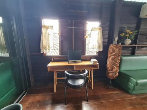 Posezení v ubytování Non House Bangkok บ้านนอนโฮสเทล