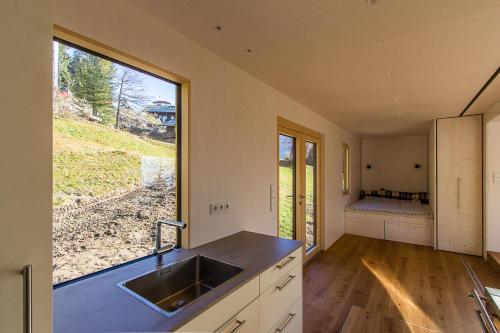 Kuchyň nebo kuchyňský kout v ubytování Biohotel Grafenast