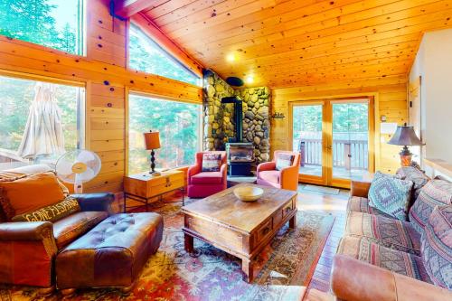 a living room with a couch and a coffee table at St Bernard Oasis in Truckee