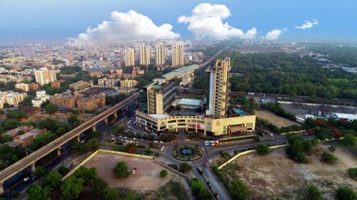 an aerial view of a building in a city at Crowne Plaza New Delhi Rohini by IHG in New Delhi