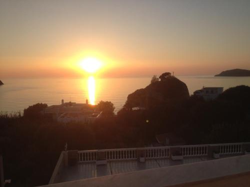 a sunset from the balcony of our apartment at Alkyonis Apartments in Panormos Kalymnos