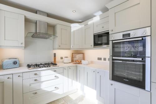 Dapur atau dapur kecil di Staddlestone Mews