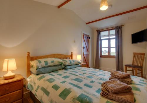 Postel nebo postele na pokoji v ubytování Caban y Gader