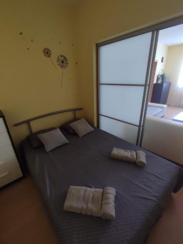 Postel nebo postele na pokoji v ubytování Elite House Trenčín