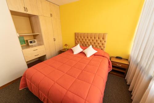 Postel nebo postele na pokoji v ubytování Hotel San Felipe Suites