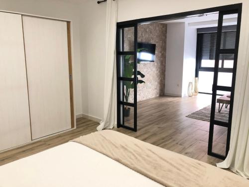 Katil atau katil-katil dalam bilik di Vivienda Turística Jaén Interior PARKING GRATUITO