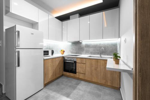 Dapur atau dapur kecil di Adelle Apartments, The Luxury Suites