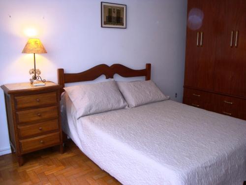 Krevet ili kreveti u jedinici u okviru objekta Apartamento Figueiredo Magalhães