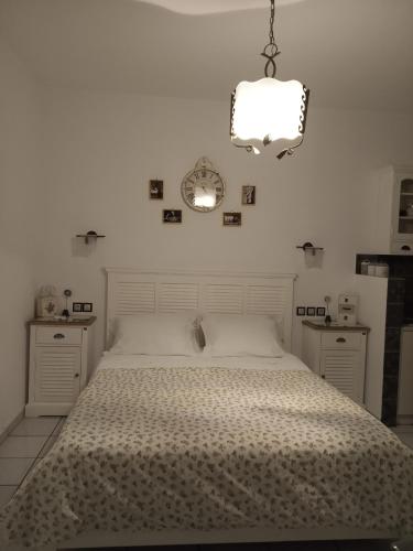 Postel nebo postele na pokoji v ubytování Giaglakis Rooms