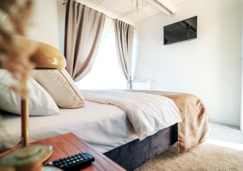 Postel nebo postele na pokoji v ubytování Arta Chalet