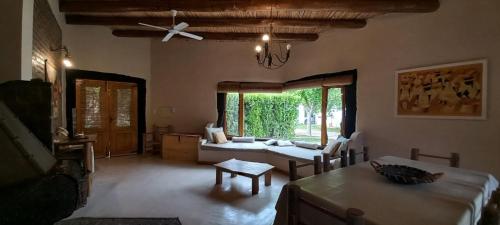 Ένα ή περισσότερα κρεβάτια σε δωμάτιο στο Casa María