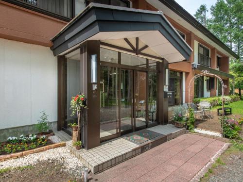 a screened in porch of a house at Yamanaka Lake ＲＹＯＺＡＮ - Vacation STAY 32157v in Yamanakako