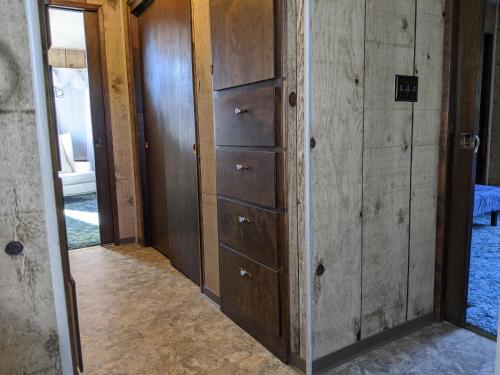 a room with wooden chests of drawers at 4 Elements House:Central, Views-Every Rm, AC, Pets in Mount Shasta