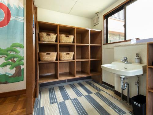 a bathroom with a sink and a sink at Yamanaka Lake ＲＹＯＺＡＮ - Vacation STAY 32157v in Yamanakako