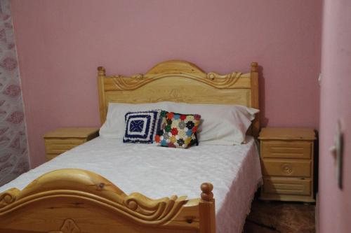 Giường trong phòng chung tại Eco-Lodge IGHAZRAN