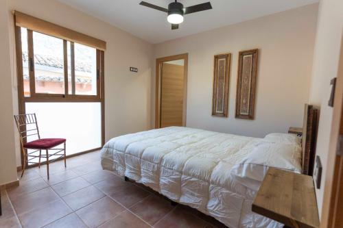 Posteľ alebo postele v izbe v ubytovaní CASA RURAL BIENVENIDA