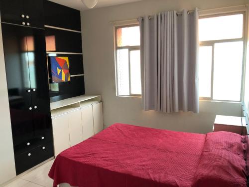 Un ou plusieurs lits dans un hébergement de l'établissement Apartamento beira mar no Cabo Branco