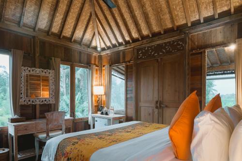 Katil atau katil-katil dalam bilik di Nauna Villa Ubud