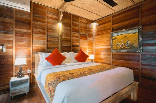 Katil atau katil-katil dalam bilik di Nauna Villa Ubud