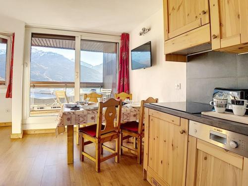 Appartement cosy aux Menuires · Accès pistes · Parking inclus - FR-1-344-850