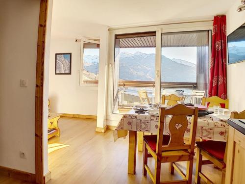 Appartement cosy aux Menuires · Accès pistes · Parking inclus - FR-1-344-850