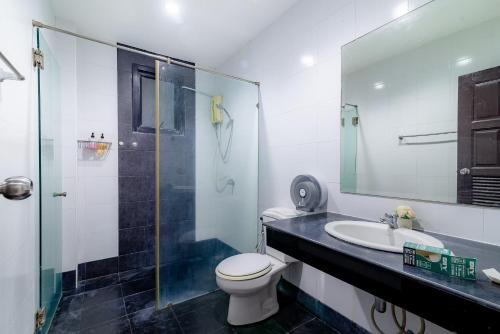 a bathroom with a toilet and a sink and a shower at Chic Chill Party Hua-Hin Private Poolvilla from beach 3km in Hua Hin
