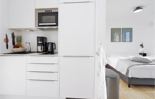 Kuchyň nebo kuchyňský kout v ubytování Beach Front Apartment