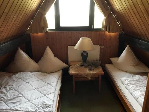 Postel nebo postele na pokoji v ubytování Ferienhaus "Blick up de Kohjen"