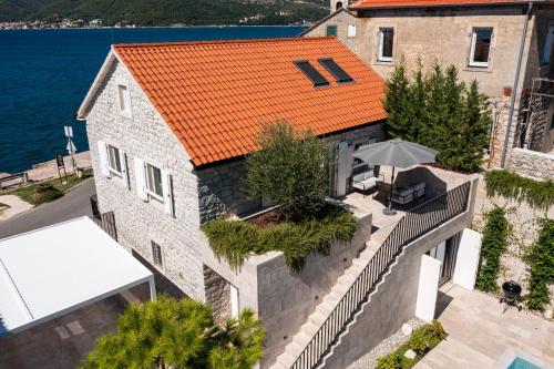 an aerial view of a house with an orange roof at Villa Lastva in Tivat