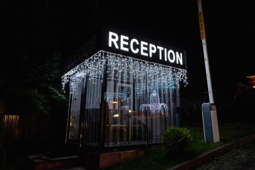 a store with christmas lights in front of it at Brooklyn in Yablunytsya