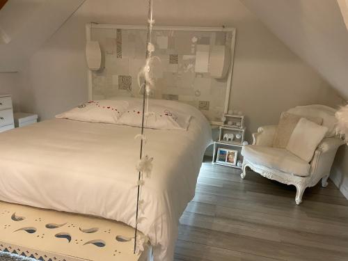 Un ou plusieurs lits dans un hébergement de l'établissement Chambres privées chez le particulier aéroport Lille Lesquin