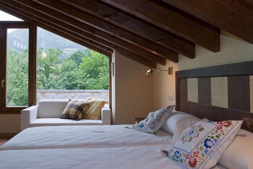 Ліжко або ліжка в номері Hotel Rural Reciegos Complejo Agroturistico