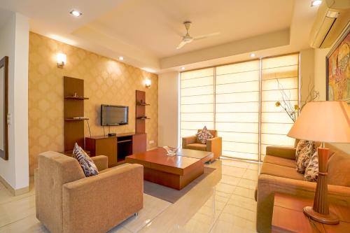 Μια τηλεόραση ή/και κέντρο ψυχαγωγίας στο Ahuja Residency Noida