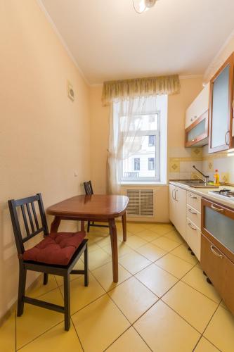 Кухня или мини-кухня в Central Apartments Maidan Area
