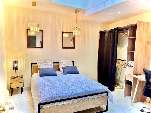 Posteľ alebo postele v izbe v ubytovaní LOFT SAINT JEAN
