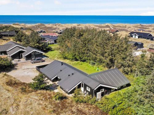 an aerial view of a house with a yard at 10 person holiday home in L kken in Løkken