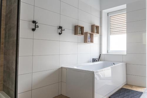 Kúpeľňa v ubytovaní Hornigold Apartament Gdynia
