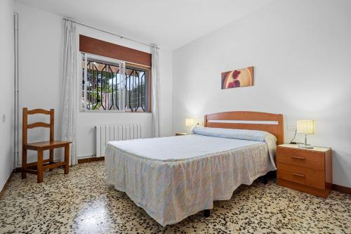 A bed or beds in a room at Villa Rosita