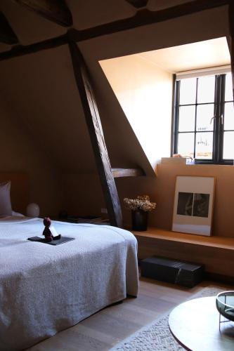 Postel nebo postele na pokoji v ubytování Audo Boutique Hotel