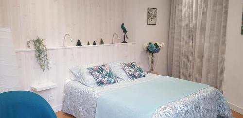 Ένα ή περισσότερα κρεβάτια σε δωμάτιο στο At home