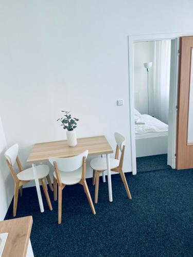 Ένα ή περισσότερα κρεβάτια σε δωμάτιο στο Apartmány Bryksova