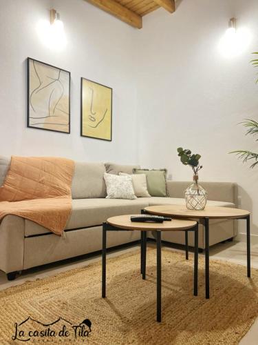 a living room with a couch and a table at La Casita de Tila in Ifonche