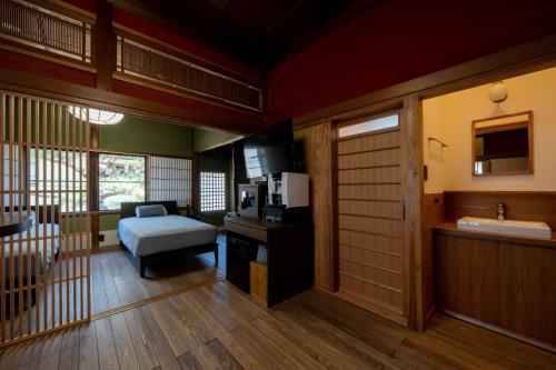 a room with a kitchen and a living room at Close to you in Kanazawa