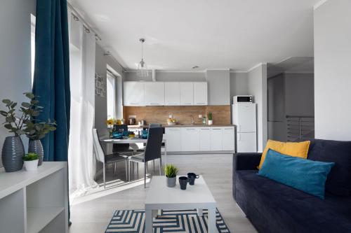 Kuchyňa alebo kuchynka v ubytovaní Apartamenty-Kudowa z pięknym widokiem i balkonem