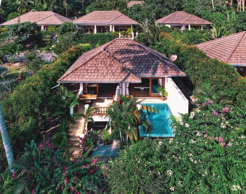 an aerial view of a house with a swimming pool at Tropical Season Villa Resort in Mae Nam