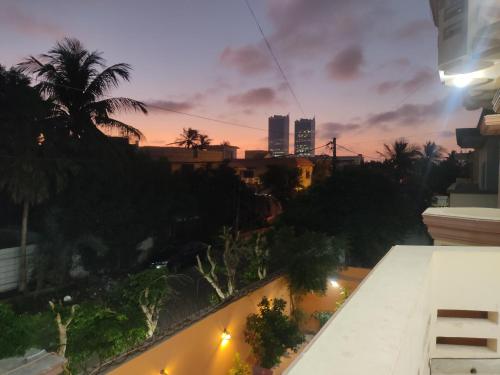 a view from the roof of a building at sunset at Waypoint Hotel in Karachi