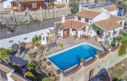 an aerial view of a house with a swimming pool at Stunning Home In Iznajar With Wifi in Iznájar