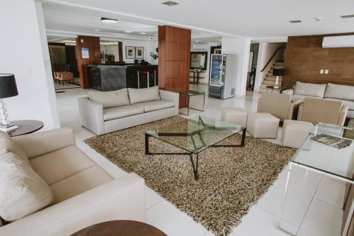 Χώρος καθιστικού στο Mar de Canasvieiras Hotel e Eventos